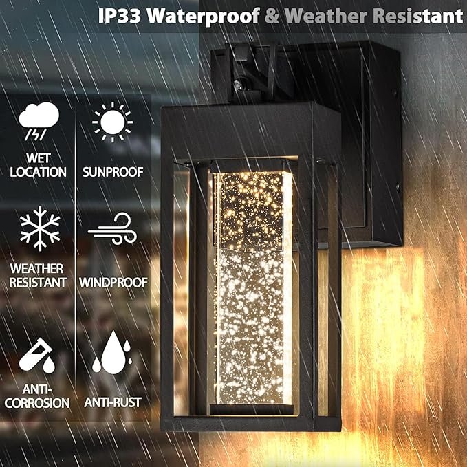 ALOADECOR 1 Light LED Modern Matte Black Dusk to Dawn Sensor Outdoor Wall Lantern Coach Sconces with Seed Glass and Built-in 2 GFCI Outlets Exterior Wall Mount Light for Garden Patio Front Door