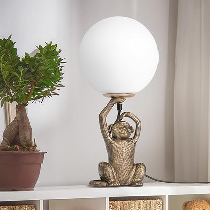 RIVER OF GOODS 17" H Emryn Gold Finish Globe Shade Monkey Table Lamp